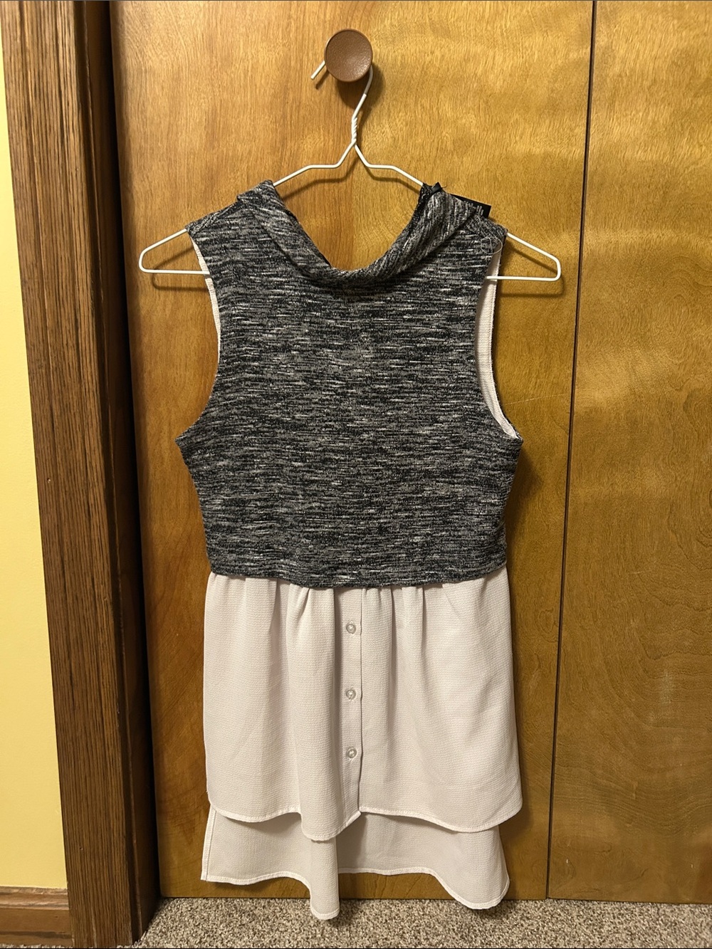 Sleeveless Layered Black and White Tunic Top with Button-Front Skirt